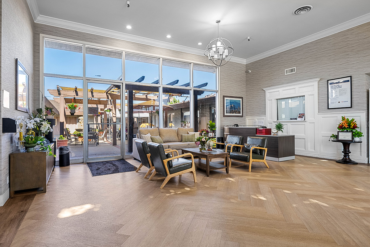 Modern lobby with comfortable seating and large windows.
