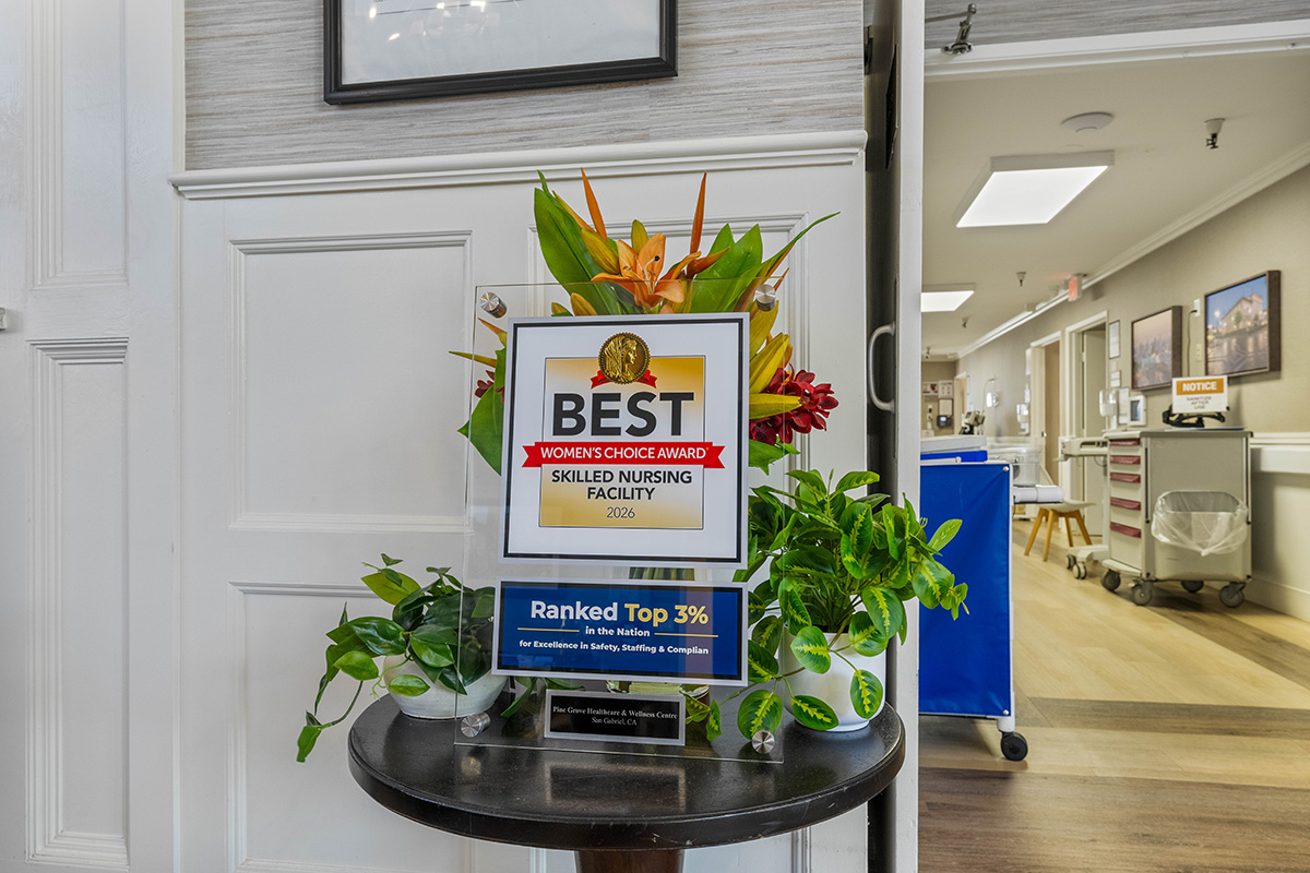 Award display for skilled nursing facility with plants.