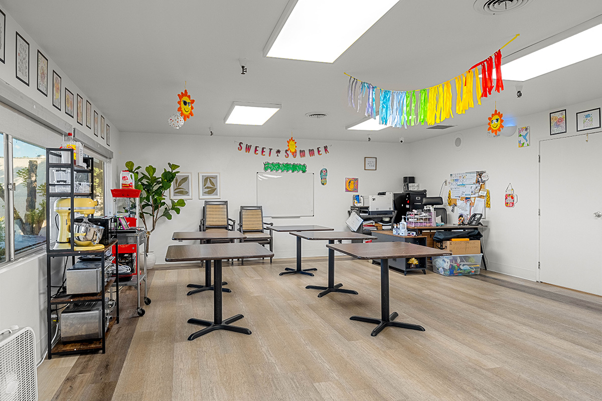 Bright, cheerful classroom setup with summer decorations.